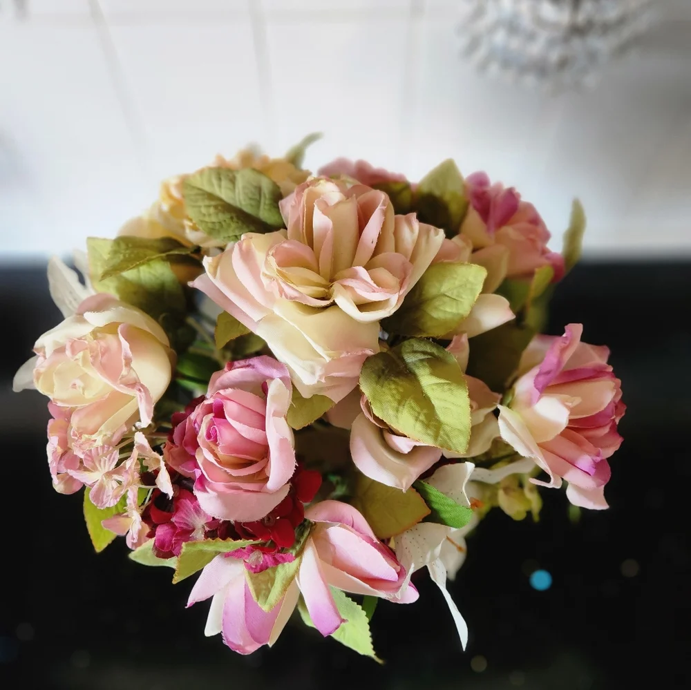 Beautiful faux flowers in vase